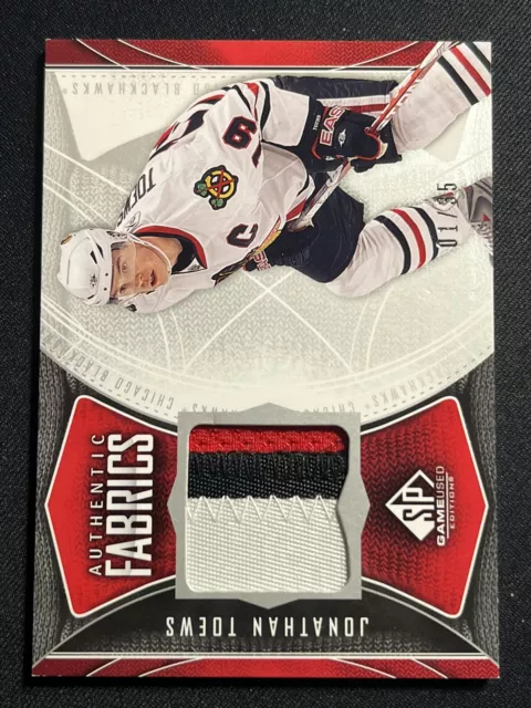 Jonathan Toews #1/35 Authentic Fabrics SP Game Used Jersey Patch Hockey Card