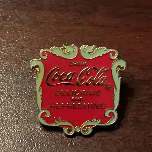 Coca-Cola Coke “Delicious And Refreshing” Filigree Lapel Hat Pin