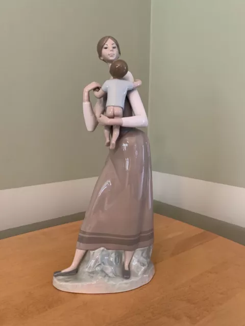 Authentic Lladro figurine, mother and child, 13.5" tall and 6.25 at widest point