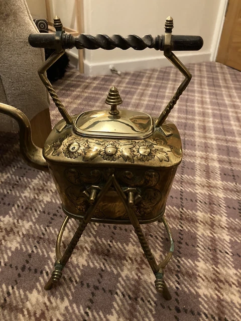 Two vintage copper and brass kettles And Stands