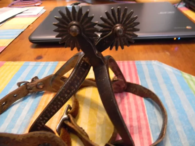 Antique cowboy spurs, North and judd