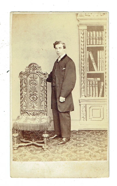 Victorian cdv photo young man standing hand on chair unstated photographer