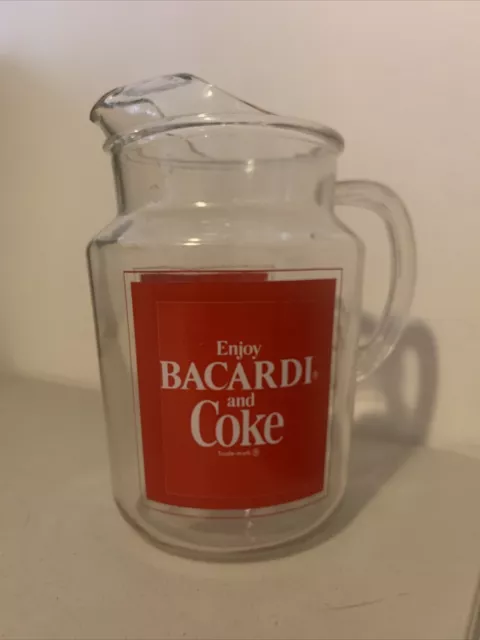 https://www.picclickimg.com/omEAAOSw-cdknM7T/Vintage-1970s-Enjoy-Bacardi-Rum-and-Coca-Cola-Coke.webp