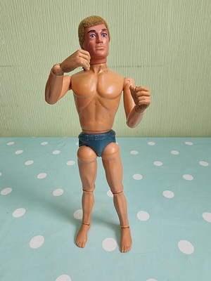action man with gripping hands