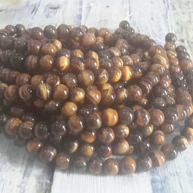 Natural Tiger Eye  8mm  Approx 48 pce Strand. Free postage. Oz Seller