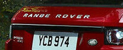 Range Rover Evoque OEM L538 Glossy Black Tailgate Edge Molding Cut With Device