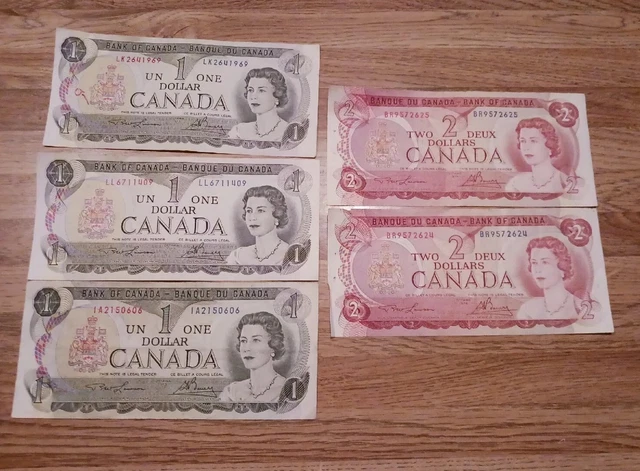 1954 Canadian $2 Banknote an (2) 1973 $1 banknotes.  lightly circulated