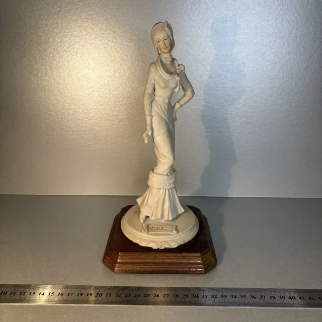 A Belcari/Capodimonte  "Dear" Figurine 1985 Signed 11” High x 5” Wide