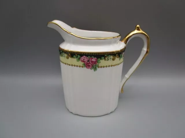 Pichet a lait ancien en porcelaine de Limoges