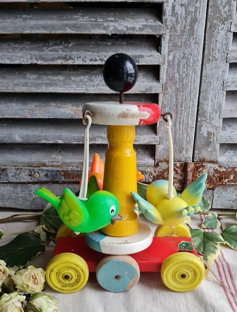 clown en bois et plastique sur tricycle- jouet à tirer educalux - Label