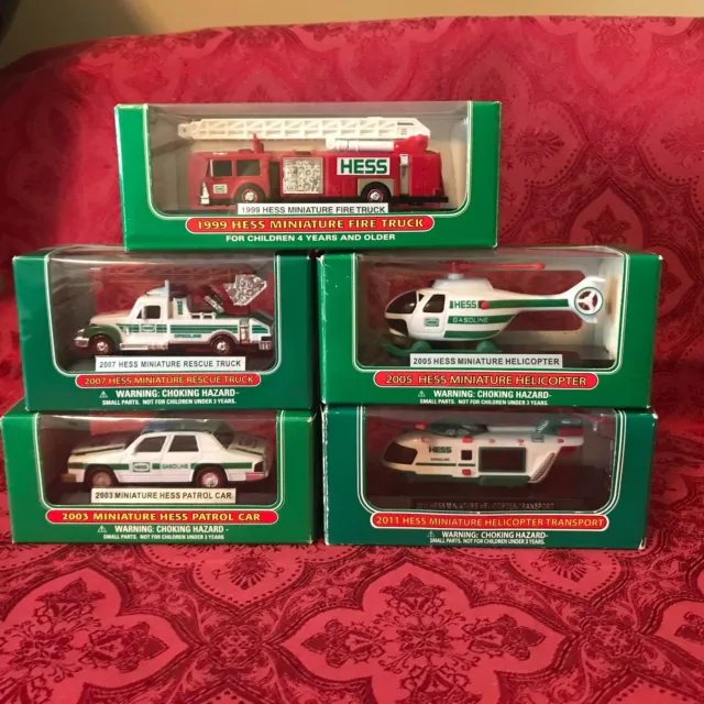 Set Of (5) Hess Mini Trucks 1999, 03, 05, 07, & 11 Direct From The Factory Case