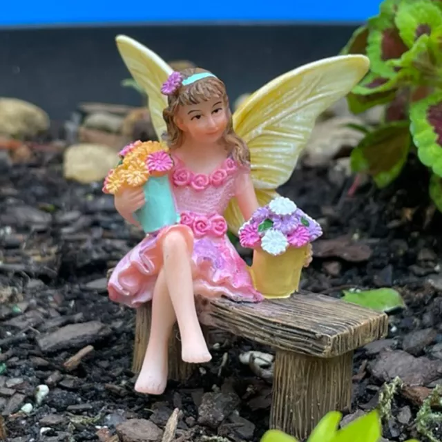 Miniature Dollhouse Fairy Garden Fairy Figurine Sitting On Bench with Flowers