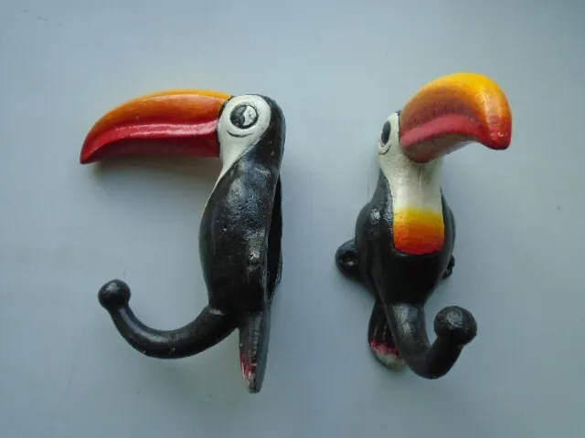 Pair of cast iron Guinness toucan style coat hooks, hangers, home bar, mancave