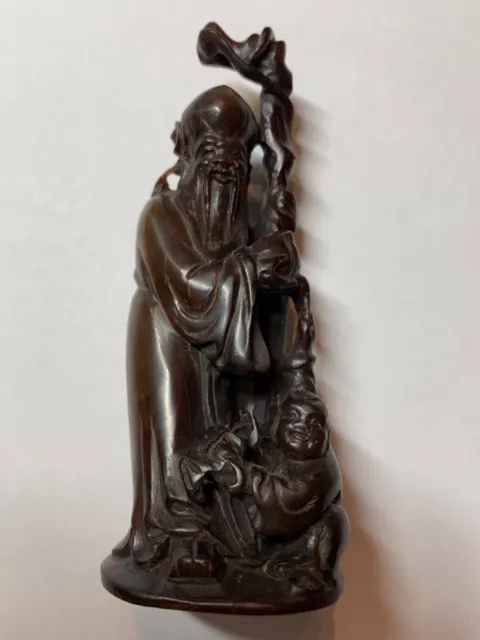 Antique Chinese Hand carved Wood figurine  Man Holding Fruit & Boy Holding Bat