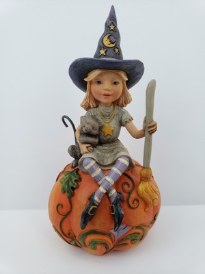 jim shore witch on pumpkin