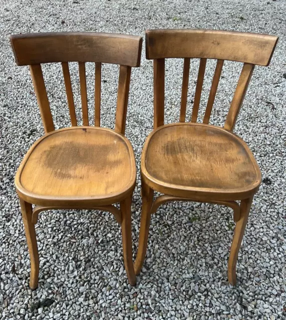 2 anciennes chaises en bois de marque BAUMANN