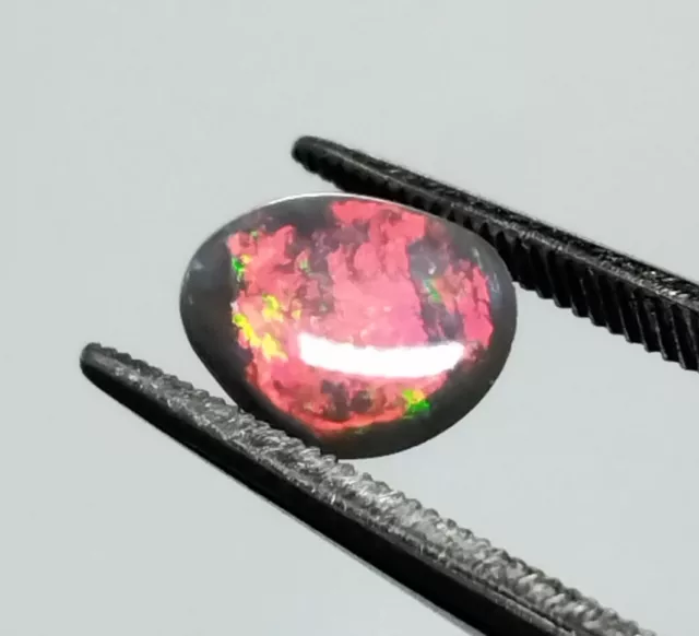 Lightning ridge black opal 0.40ct red gold green purple colour