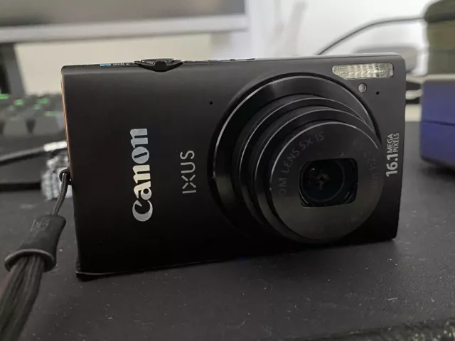 Canon IXUS 240 HS black digital camera WiFi touch screen.