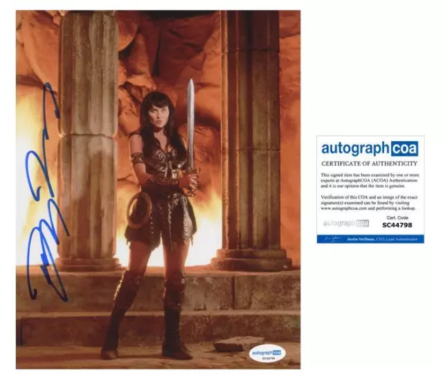 Lucy Lawless "Xena: Warrior Princess" AUTOGRAPH Signed 8x10 Photo C ACOA