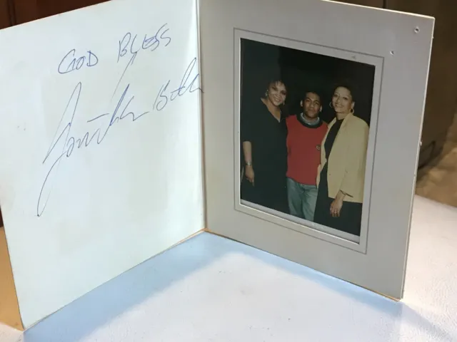 Pretty 3"x4" Photo in cardboard frame  says God Bless I can't read the name