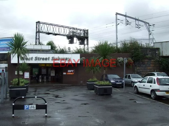 Photo  West Street Subway Station Hanging Baskets And Potted Palm Trees Add A Sp