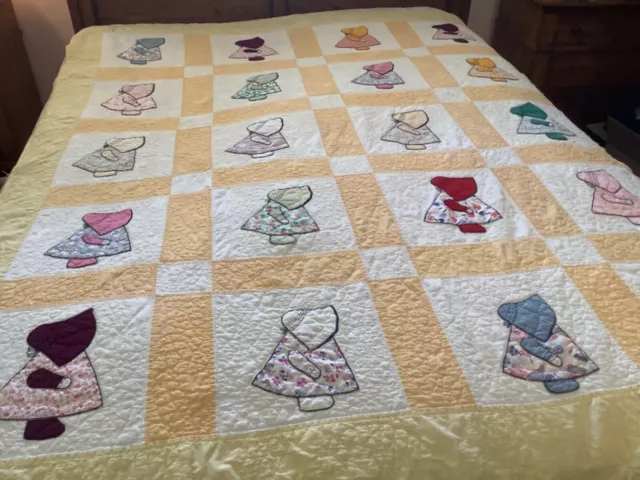 Vintage handmade quilt w/ Sunbonnet Sue It is quite old 78 X 64 in.