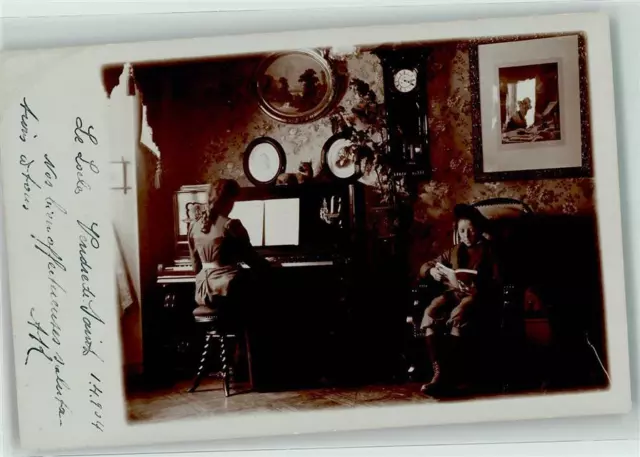 39412072 - Frau am Klavier , Kind beim Buch lesen AK Klavier Spinett 1904