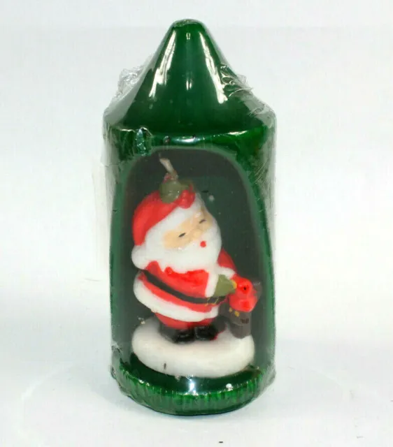 https://www.picclickimg.com/p84AAOSwdvxd1PlN/Vintage-Santa-Candle-6-3-4-Green-Made-in.webp