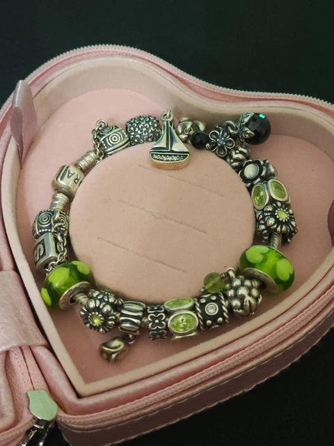 PANDORA CHARM BRACELET with genuine PANDORA charms 900.00