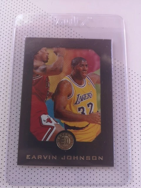 A Statue Of Magic Johnson Dribbling A Basketball A Lakers Uniform With