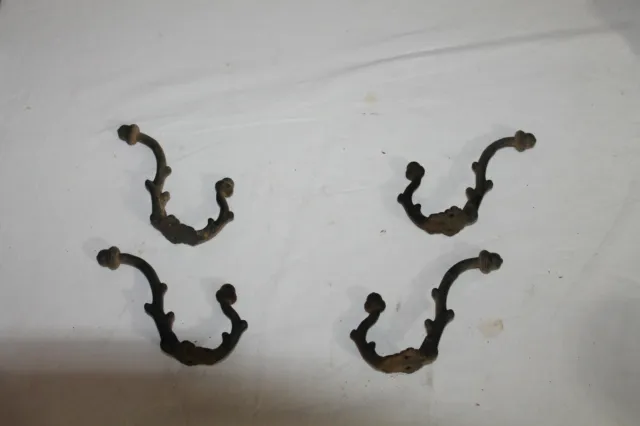 4 pc.  large Antique early 1900`s cast iron coat hat tack hooks wall hangers