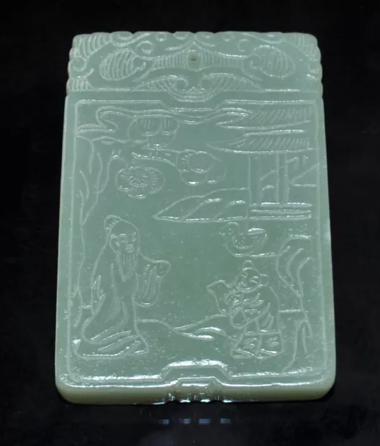 a Chinese celadon jade pendent carved with house gentleman child with poet?