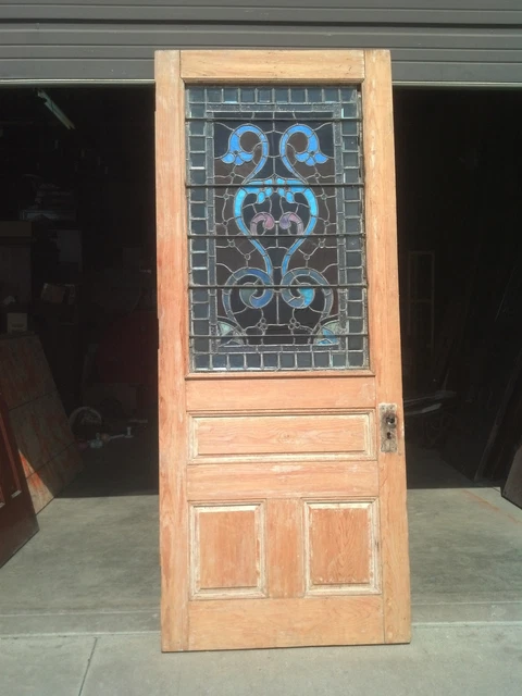 1/2 stained/beveled/jeweled stripped entrance door   (ED 4)
