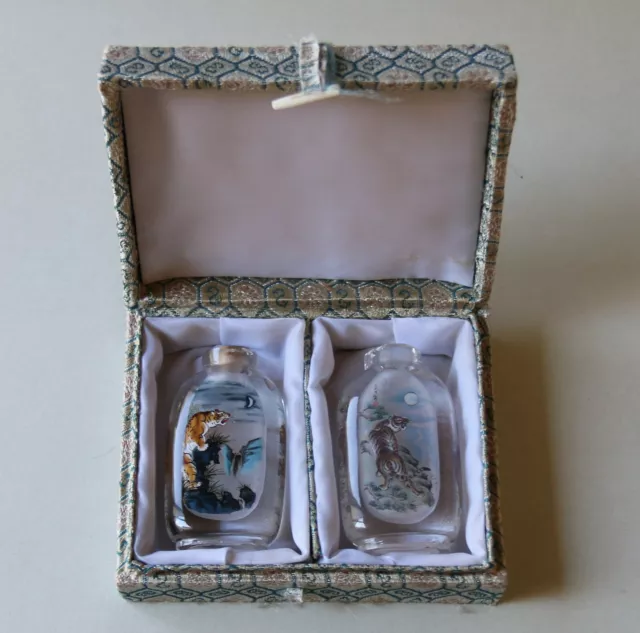 Boxed Pair of Vintage Chinese Revers Painted Tigers Glass Crystal Snuff Bottles