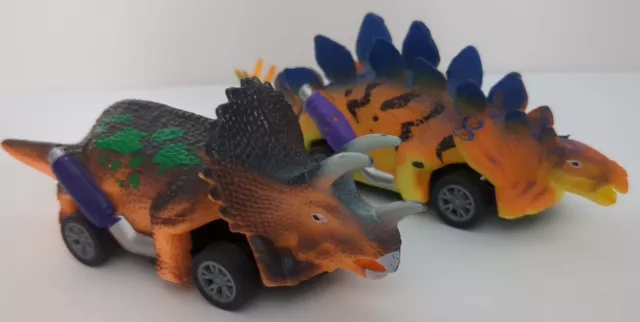 2 X Dinosaur Pull Back and Go Vehicles - Preowned. Very Good Condition. 13x3.5cm