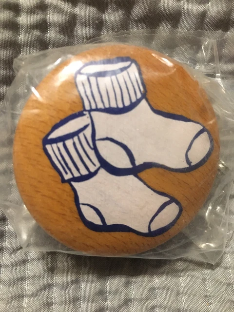 Wooden Organizational Dresser Drawer Knob 2” Round With White Socks On It