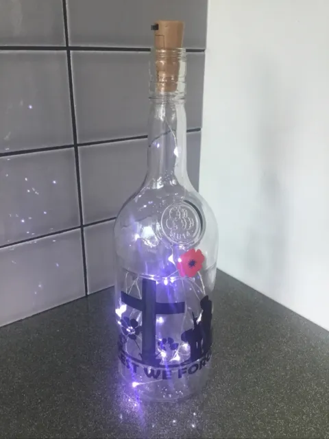 Lest we forget light up bottle.(Gift wrapped.)