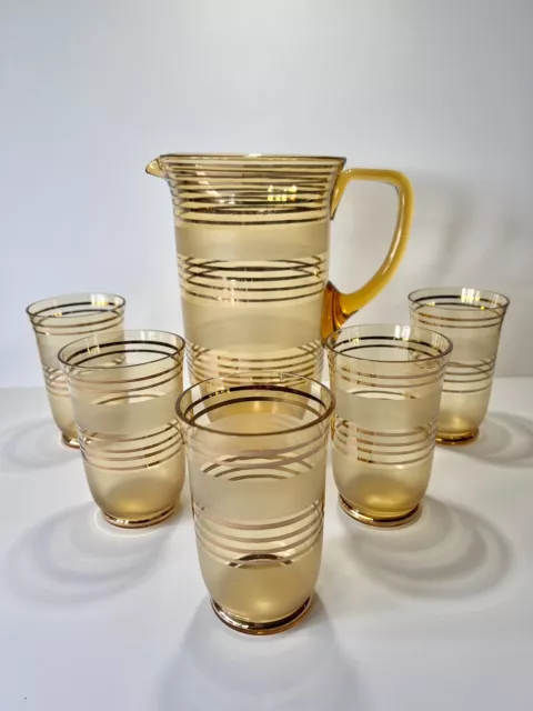 Pitcher Set.  jug with five glasses.  Gold stripes & frosted glass. MCM.