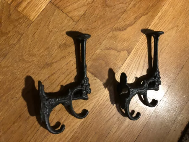 Pair of Ornate Cast Iron Hooks