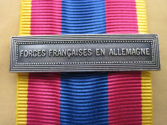Agrafe  FORCES FRANCAISES EN ALLEMAGNE (2)  pour la Médaille Défense Nationale