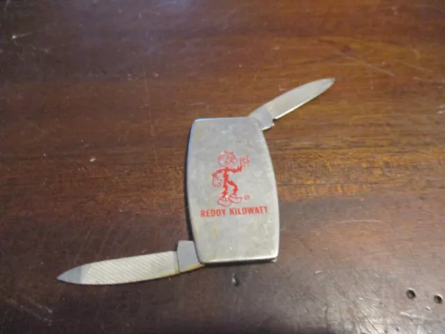 Featuring  Reddy Kilowatt Advertising Zippo 2 Blade Pocket Knife