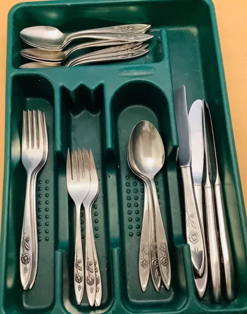 Oneida Community Stainless Flatware 24 Pc Set in the “My Rose” pattern.