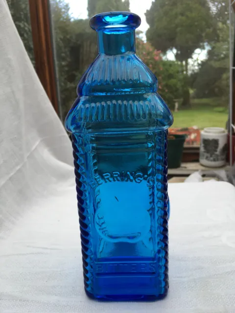 Large "Berring's Apple Bitters Philadelphia" blue glass display bottle Wheaton