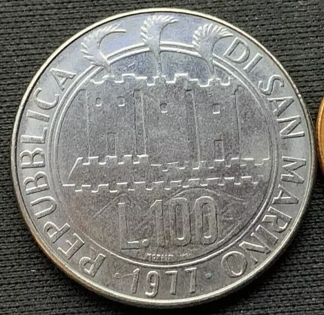 1977 San Marino 100 Lire UNC Wounded Earth ( 565K )     #M219