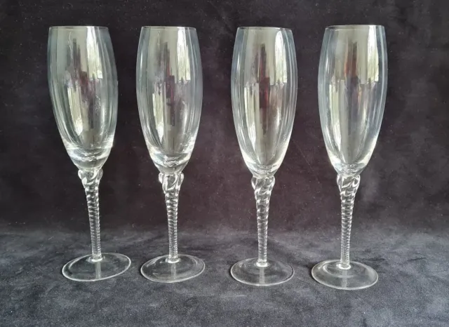 Stunning twisted stem champagne flute glasses