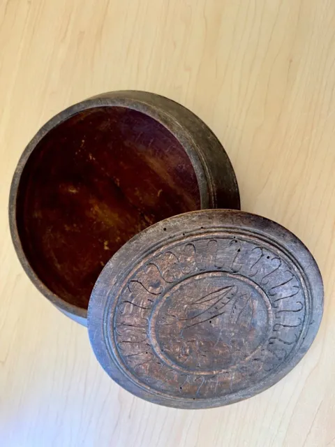 vintage round wooden box with carved lid