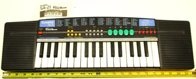 Teclado de música portátil CASIO SA-21 vintage de 1990 usado, funcional con manual