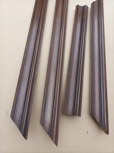 Lot de 4 anciennes et larges  baguettes en bois laqué marron Napoléon III