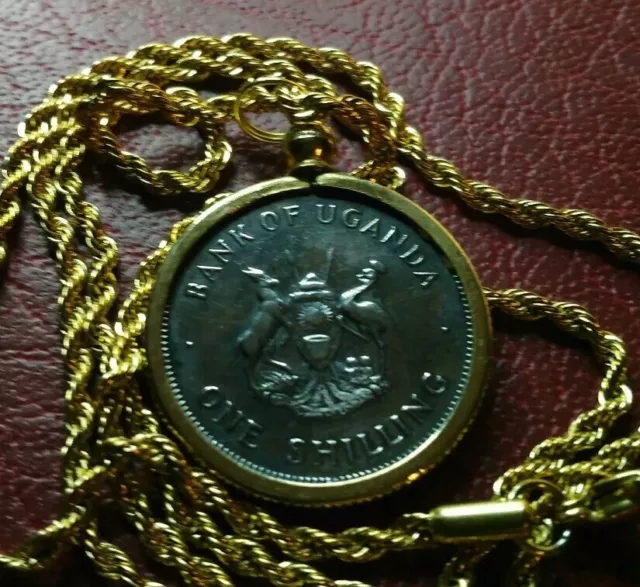 1968 Bank of Uganda Emu Shilling Pendant on a 24" Gold Filled Rope Chain.
