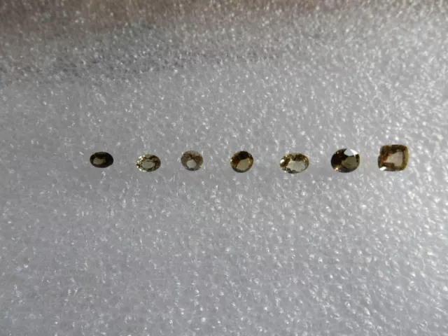 Kornerupine x 7, various colours (see description), 7.37cts total